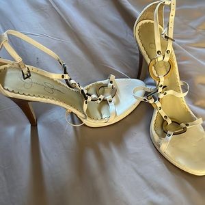 White heels with wooden heels detailed